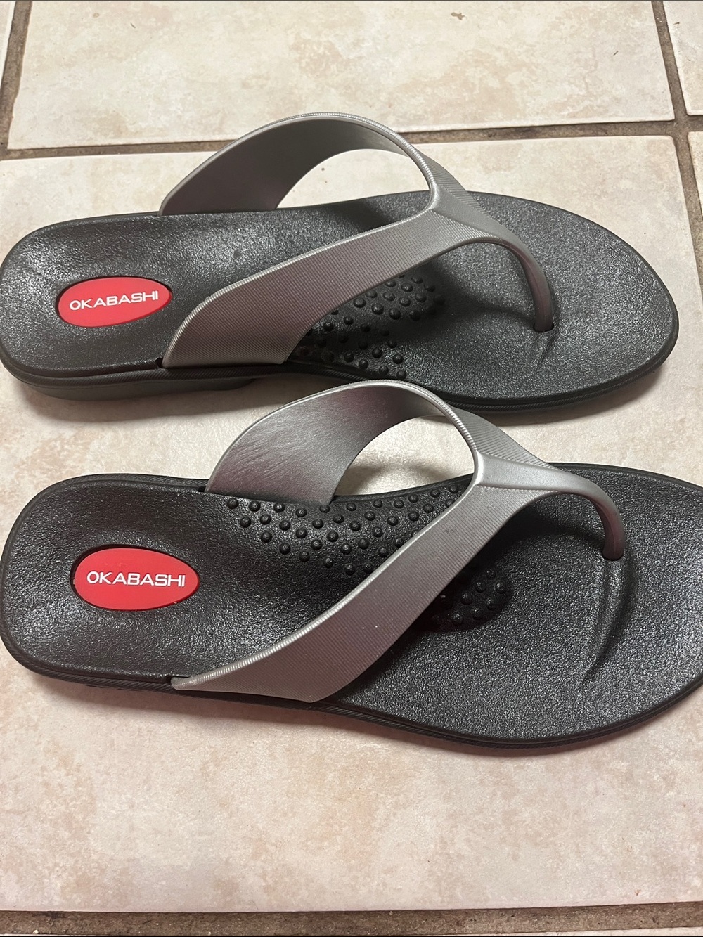 Okabashi women’s Black Flip Flops with silver Straps size M/L